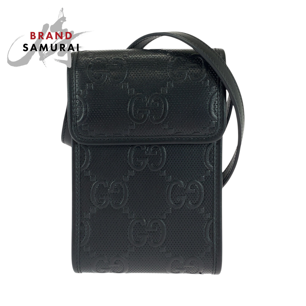 GUCCI GG embossed black leather shoulder bag Clutch